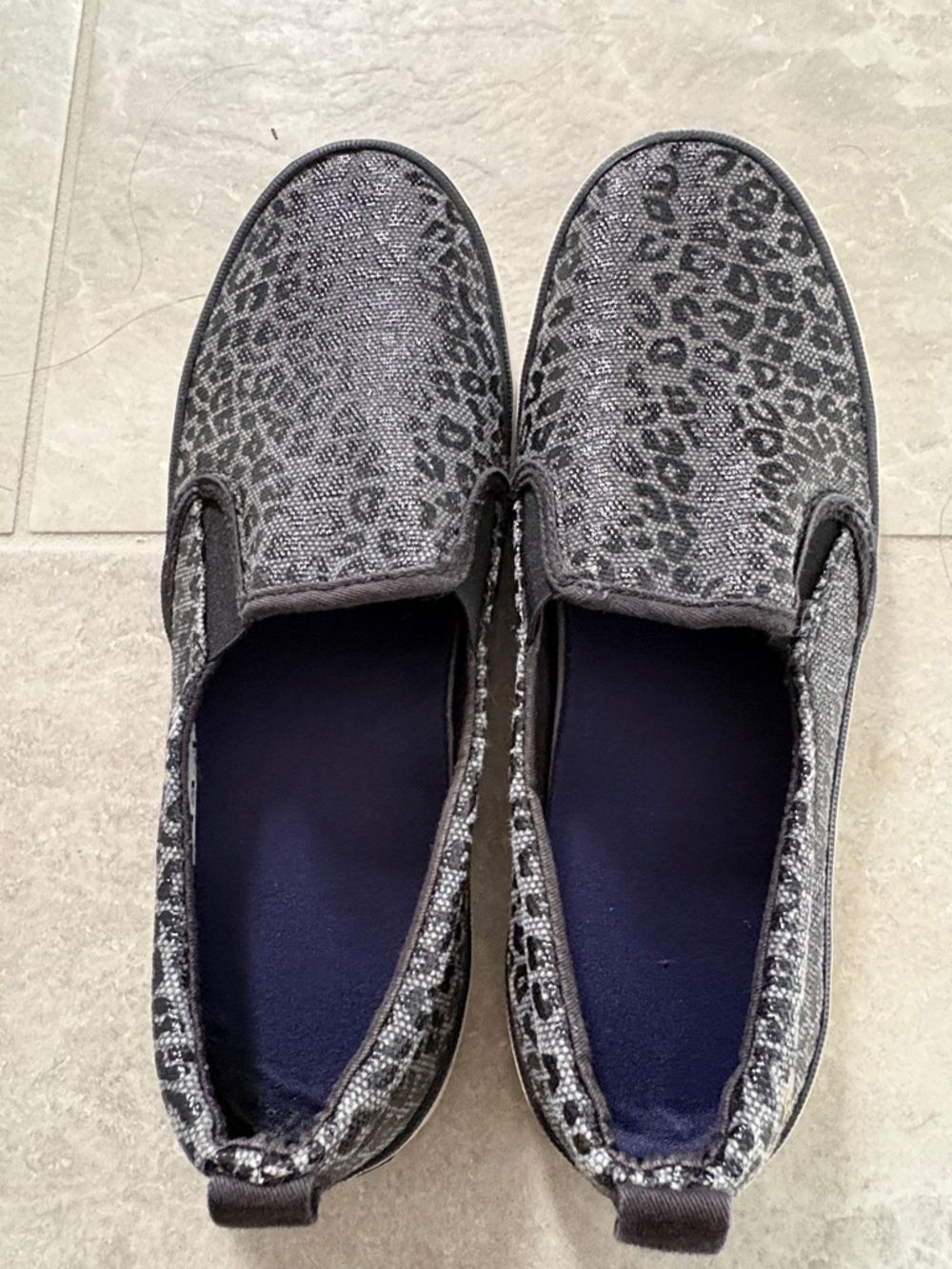 Black cheetah print Sperry slip on shoes